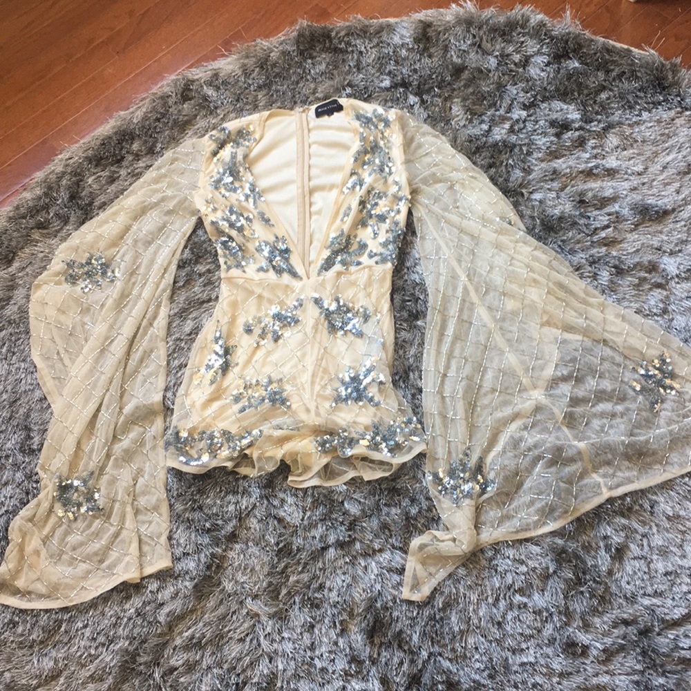 Peace and love romper with amazing flow sleeves